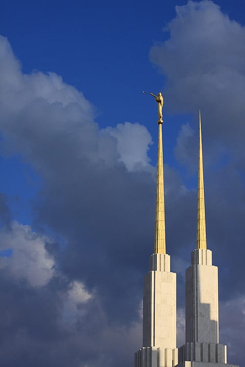 Temple spires rising into a dramatic sky