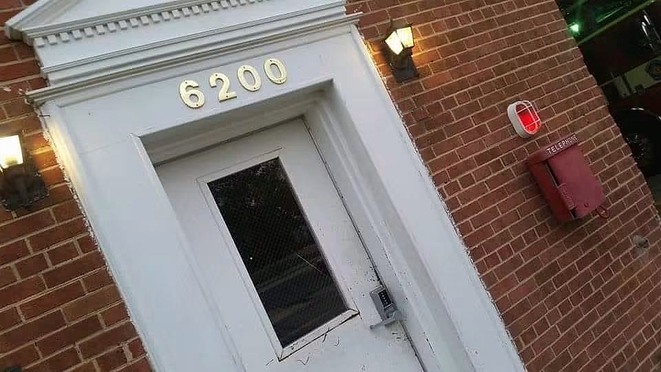 The 6200 firehouse door at dusk