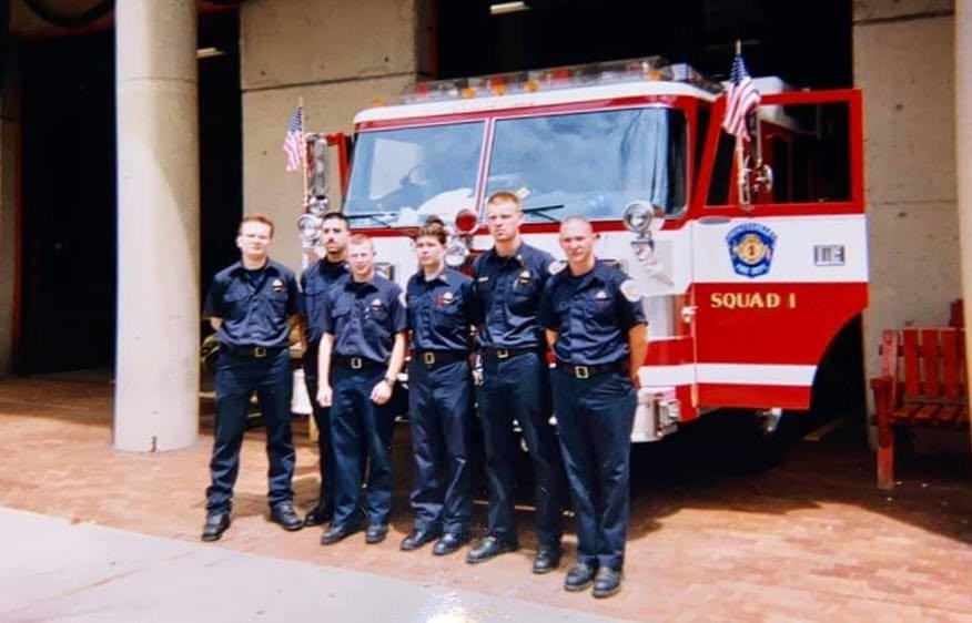 A Hyattsville Squad 1 crew in front of the apparatus